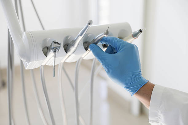 Professional Invisalign Clear Aligners technician working in Iron River, MI